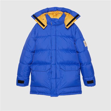 蓝色The North Face x Gucci联名系列羽绒夹克 